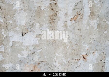 Old whitewashed lime plaster wall, grunge background or texture Stock Photo