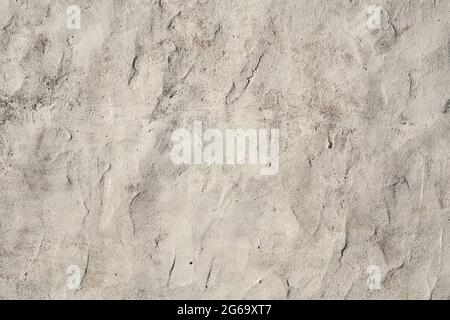 Old white painted limewashed plaster wall texture or background Stock Photo