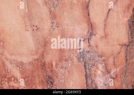 Pink marble old wall, scratched grunge background or texture Stock Photo