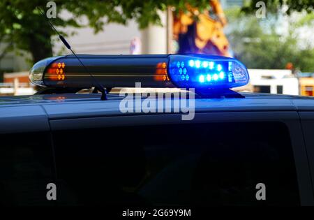 Warning lights on police car. Blue lights with LED switched on. Close up. Stock Photo