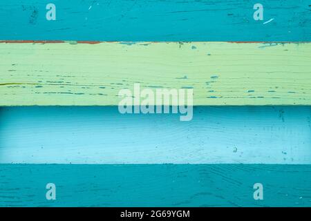 Distressed blue and green painted wooden planks wall background Stock Photo