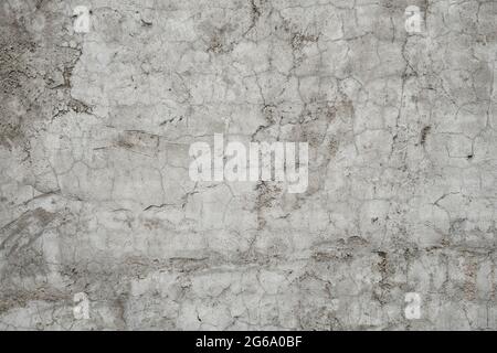 Old cracked raw concrete wall texture grunge background Stock Photo