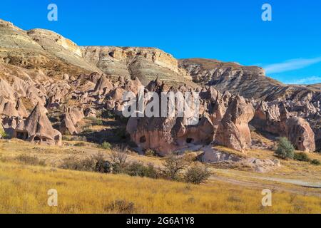 Uchisar, 04, October,2018: Spectacular volcanic rock formations in the shape of cave houses on Uchisar valley hills,Cappadocia ,Turkey Stock Photo
