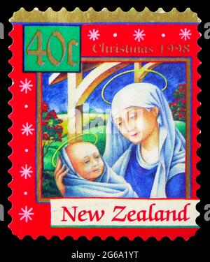 MOSCOW, RUSSIA - APRIL 18, 2020: Postage stamp printed in New Zealand shows Mary and Child, Christmas serie, circa 1998 Stock Photo