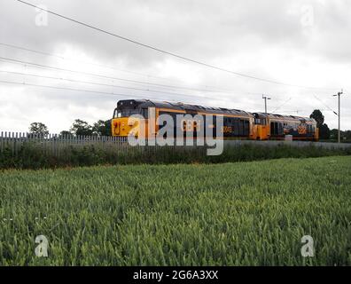 GBRF Class 50 locomotives 50049 'Defiance' and 50034 'Furious'/50007 'Hercules' on the West Coast Main Line near Northampton, UK Stock Photo