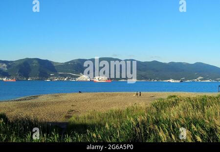 Magnificent blue sea and mountains background for the design of a website for tourism Stock Photo