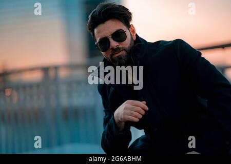 The one that you want, Handsome man in winter coat Stock Photo