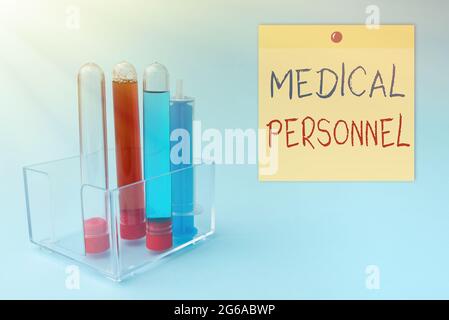 Sign displaying Medical Personnel. Word for trusted healthcare service provider allowed to treat illness Presenting Medical Samples Laboratory Testing Stock Photo