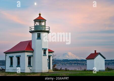 Beautiful Point Robinson Lighthouse with Mount Rainier in the Backdrop during Sunset Stock Photo