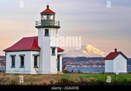 Beautiful Point Robinson Lighthouse with Mount Rainier in the Backdrop during Sunset Stock Photo