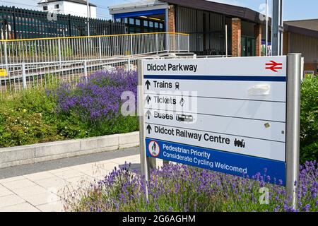 Didcot, England - June 2021: Sign outside the entrance to Didcot Parkway railway station showing passengers where to go for tickets and trains Stock Photo