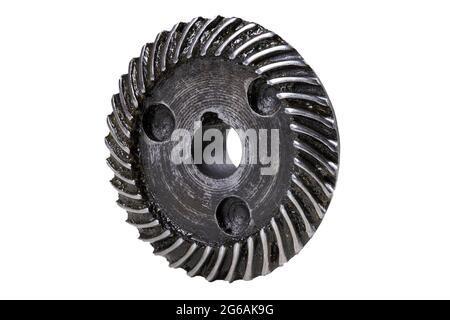Metal gear with damaged teeth. Slanting teeth in the gear wheel. Isolated background. Stock Photo