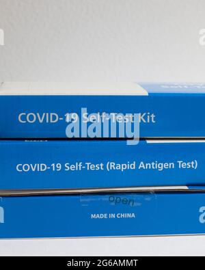 Boxes of UK Government COVID-19 coronavirus self test NHS kits made in China Stock Photo