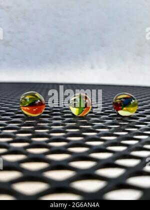 Kids Marbles. Colorful glass made Marbles. Glass Marbles. Stock Photo