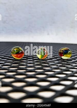 Kids Marbles. Colorful glass made Marbles. Glass Marbles. Stock Photo