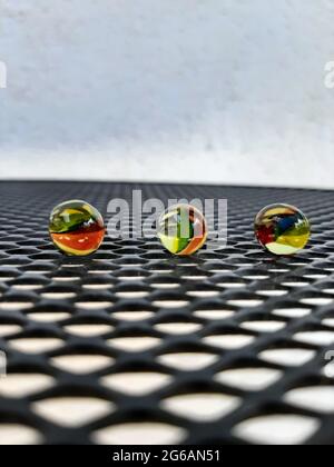 Kids Marbles. Colorful glass made Marbles. Glass Marbles. Stock Photo