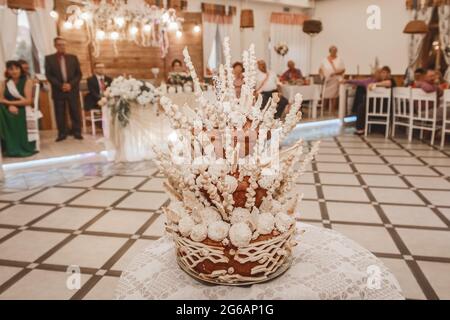 Wedding pastries, multi-tiered decorative pie, confectionery delicacy. Stock Photo
