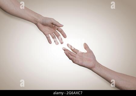 Giving a helping hand, hope and support each other. Help and solidarity concept Stock Photo