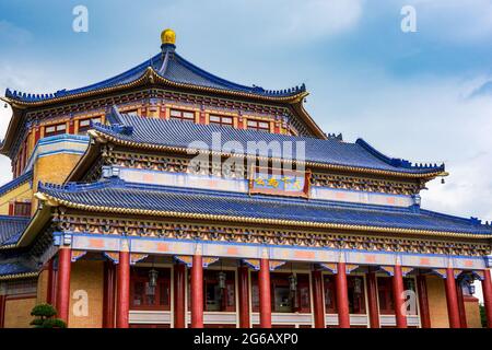 The overall appearance of the Sun Yat-sen Memorial Hall in Guangzhou, China. Translation: The world is the public. Stock Photo
