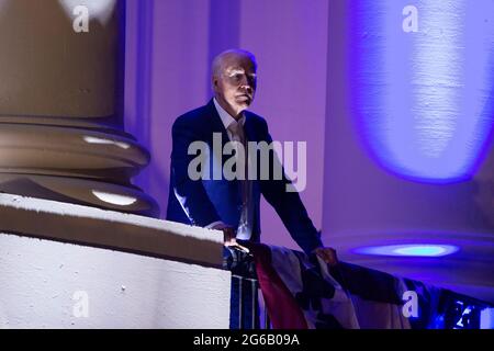 Washington, United States. 04th July, 2021. US President Joe Biden watches fireworks on the National Mall from the Truman balcony of the White House, with friends, family and visitors during a celebration of Independence Day in Washington, DC, USA, 04 July 2021. Credit: Sipa USA/Alamy Live News Stock Photo