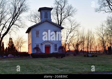 La Fox, Illinois, USA. A well-maintained vintage home, the Potter House, basks in the late-afternoon light on a late winter day. Stock Photo