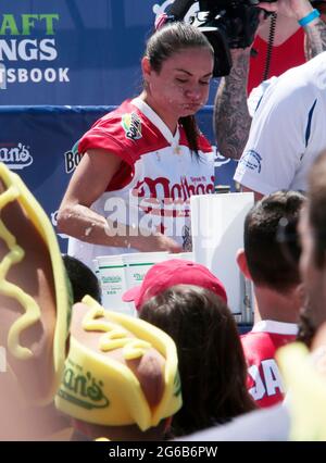 Coney Island, New York, USA. 4th July, 2021. Mchelle Lesco during the Nathan's Hot Dog Eating Competition with appearances by New York City Mayor Bill De Blasio, Brooklyn Attorney General Eric Gonzalez and others celebrating the Fourth of July on July 4, 2021 in the Coney Island section of New York City. Credit: Mpi43/Media Punch/Alamy Live News Stock Photo