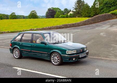 1989 80s eighties green British MG Maestro Turbo 1998cc petrol 4dr classic saloon en-route to Leighton Hall classic car July car show, Carnforth, Lancashire UK Stock Photo