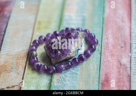 Amethyst druse bracelet purple natural stone jewelry. Photo of natural materials. Stock Photo