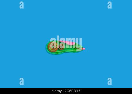 tape corrector on a blue background. office accessories Stock Photo