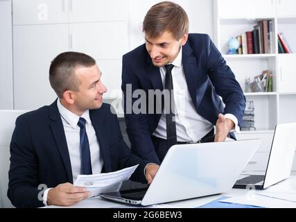 two young managers in office. Stock Photo