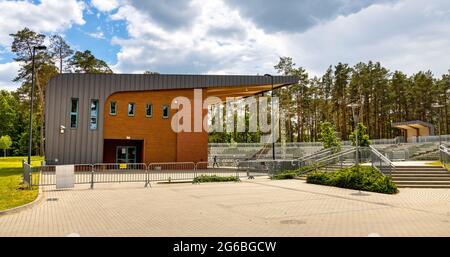 Augustow, Poland - June 1, 2021: Open air amphitheater performance stage on shore of Necko lake in Masuria lake district resort town of Augustow Stock Photo
