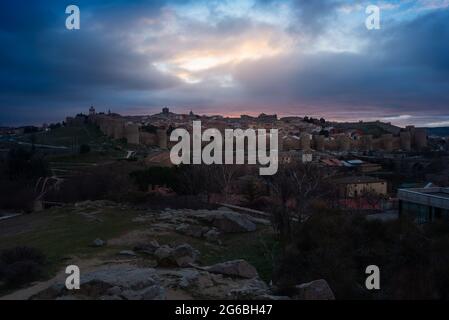 Panoramic view of the medieval town walls of Avila from Los Cuatro Postes Calvary, Spain Stock Photo