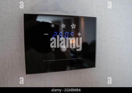 modern digital air condition panel on wall Stock Photo