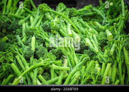 Fresh broccolini on display at Broadway Market, a street market in Hackney, East London Stock Photo