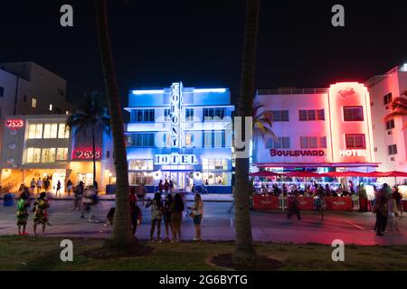 Miami, USA - April 18, 2021: night view at Ocean Drive steet with art-deco hotels in Florida Stock Photo