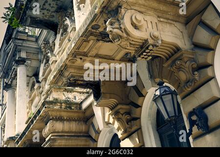 Damaged elements of the facade of a historic building. Odessa Ukraine, Primorsky boulevard, natural light. Stock Photo