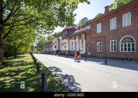 The main street in the Fiskars village, a historical ironworks area and popular travel destination. Stock Photo