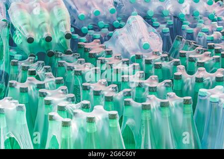 Plastic bottles of water wrapped in plastic membrane Stock Photo