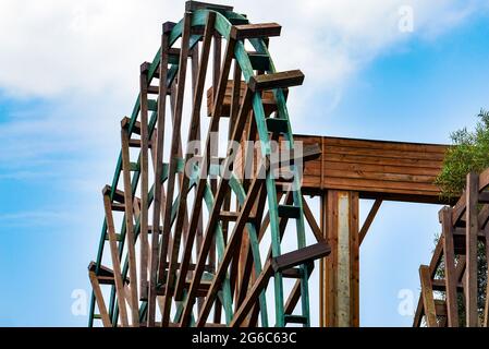 Chinese village traditional wooden waterwheel close-up, farming equipment Stock Photo