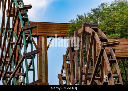 Chinese village traditional wooden waterwheel close-up, farming equipment Stock Photo