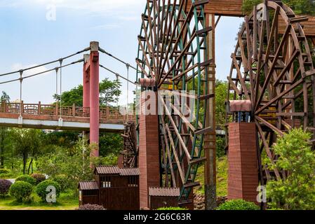 Chinese village traditional wooden waterwheel close-up, farming equipment Stock Photo