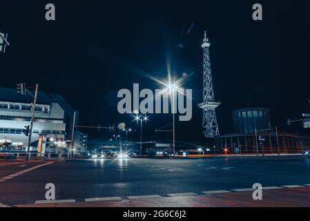 Messe Berlin, Messe Damm in Berlin Germany at night with radio tower in Background, Crossroad at night in berlin Stock Photo