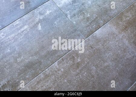 Grey stone texture pattern - patchwork tile / tiled background Stock Photo