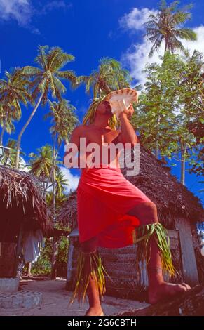 Moorea: A tribal man with a horn, often used for ceremonies Stock Photo