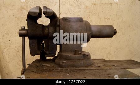 A Bench Vise Mounted on a Steel Pedestal Stock Photo