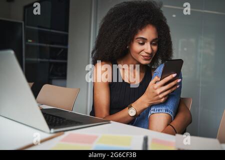 Getting distracted from work by cute messages Stock Photo