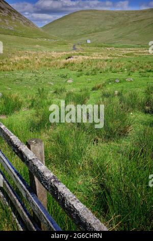 The B709 between Eskdalemuir and Ettrick winding its way through the hills. Stock Photo