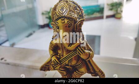 Lord Ganesha dancing idol in focus Stock Photo