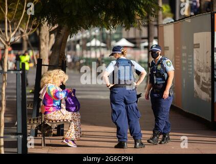 Sydney, Australia. 5th July, 2021. Police officers work on the street in Sydney, Australia, on July 5, 2021. Authorities of the Australian state of New South Wales (NSW) said compliance is key to a smooth exit from the two-week lockdown, as 35 locally acquired COVID-19 cases were reported on Monday. Credit: Hu Jingchen/Xinhua/Alamy Live News Stock Photo