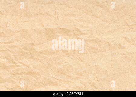 Crumpled paper texture background. Light brown color Stock Photo